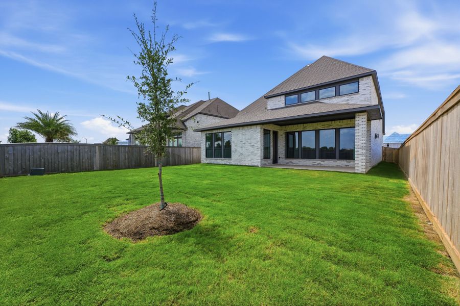 Exterior details and patio area of a home in Bridgeland 50′, Cypress (Image 24).