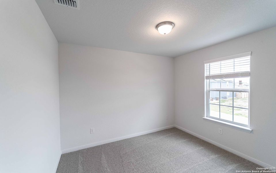 Spacious, unfurnished interior of a new home in Red Hawk Landing, San Antonio (Image 15).