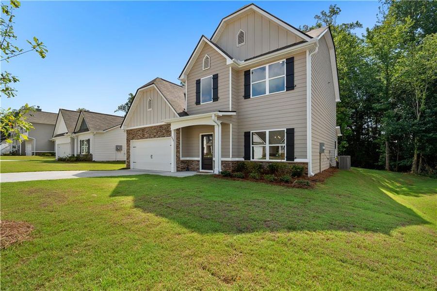 Front exterior of a new home in , Villa Rica, GA, highlighting curb appeal (Image 18).