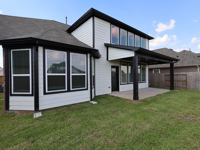 Exterior details and patio area of a home in Summerview, Fulshear (Image 3). Exterior details and patio area of a home in Summerview, Fulshear (Image 3).