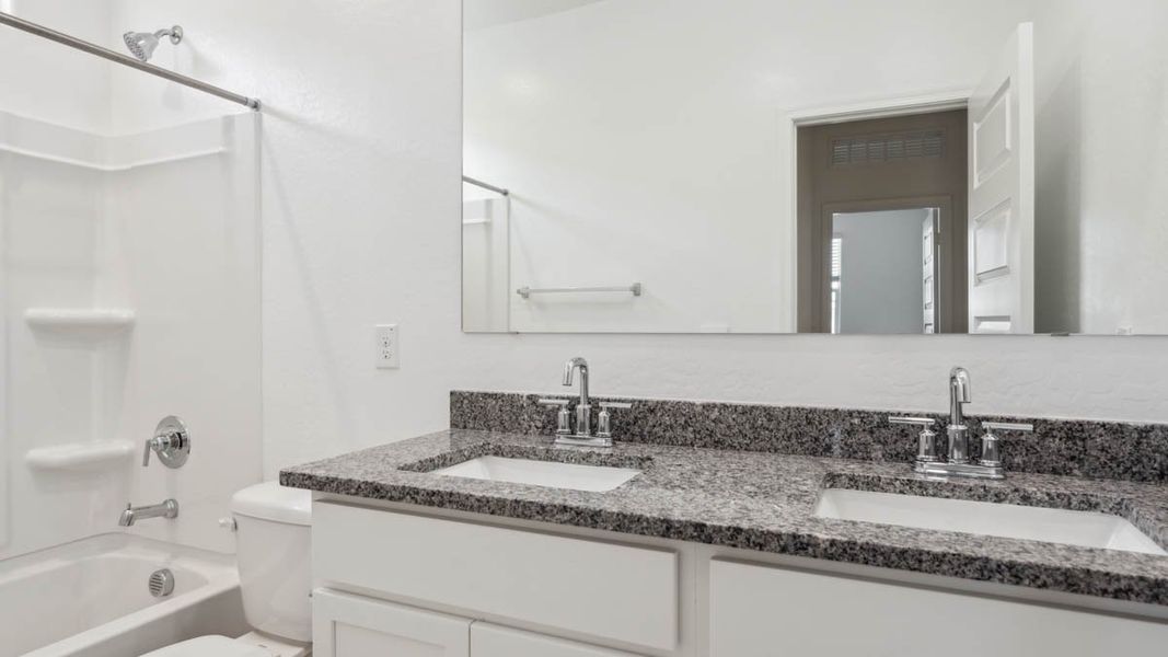 Representative furnished interior of a home built from the Mitchell by D.R. Horton in Upper Canyon, Phoenix (Image 12).