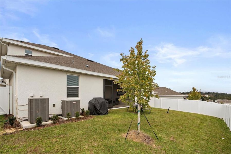 Exterior details and patio area of a home in Hills of Minneola, Minneola (Image 23).