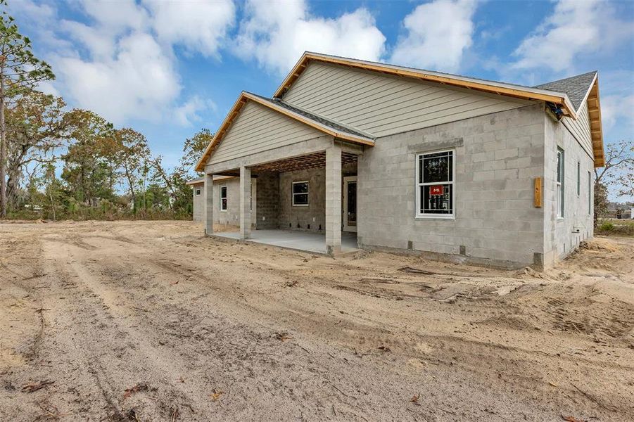 Exterior details and patio area of a home in , Wildwood (Image 3).