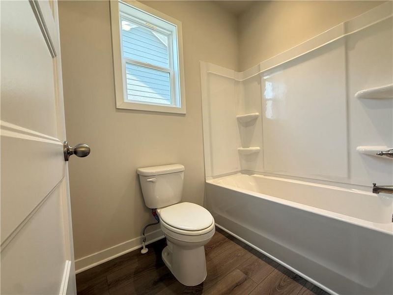 Furnished interior view inside a new home in Ponderosa Farms Manor, Gainesville (Image 9).