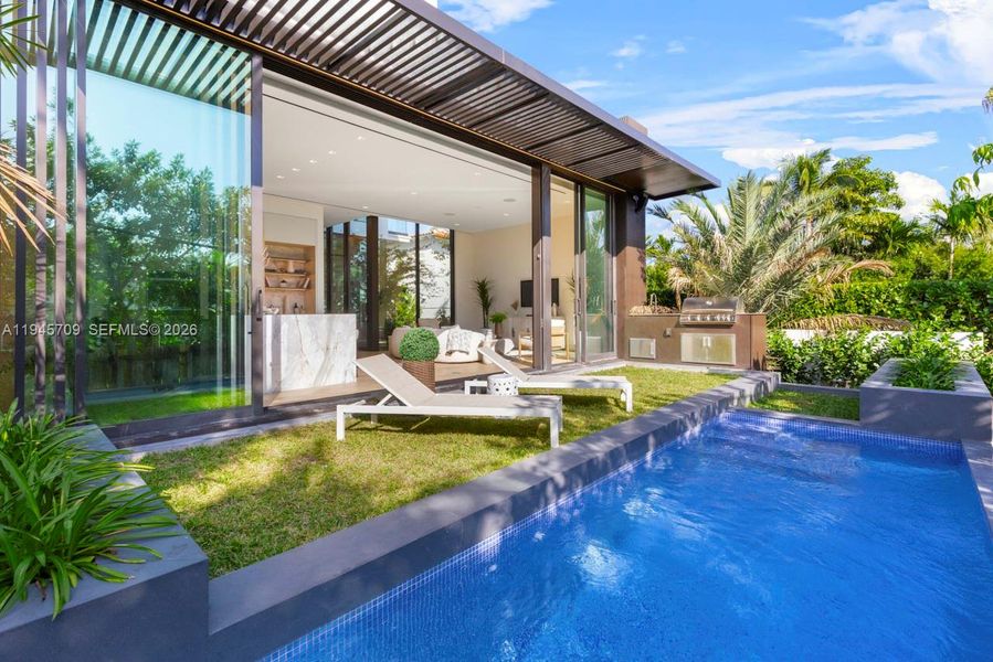 Exterior details and patio area of a home in , Miami Beach (Image 22).