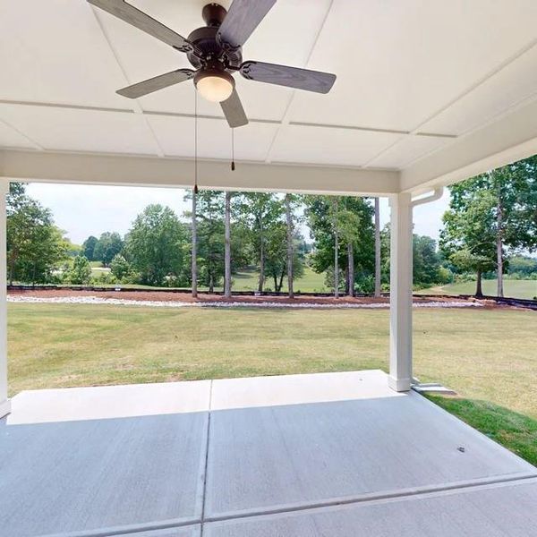 Exterior details and patio area of a home in Mirror Lake at South Harbour, Villa Rica (Image 3).