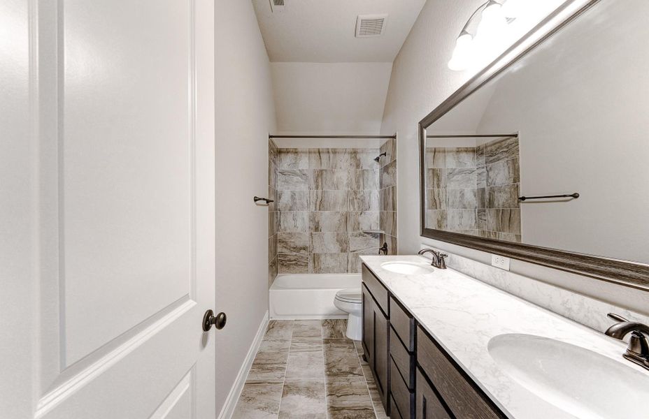 Furnished interior view inside a new home in Bridgeland 60′, Cypress (Image 15).