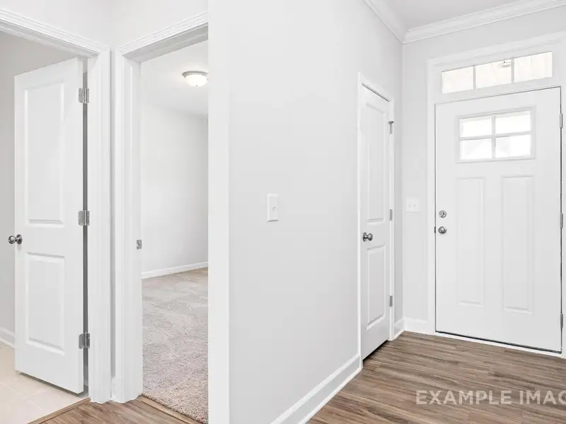 Spacious, unfurnished interior of a new home in Retreat at North Main, Lillington (Image 9).