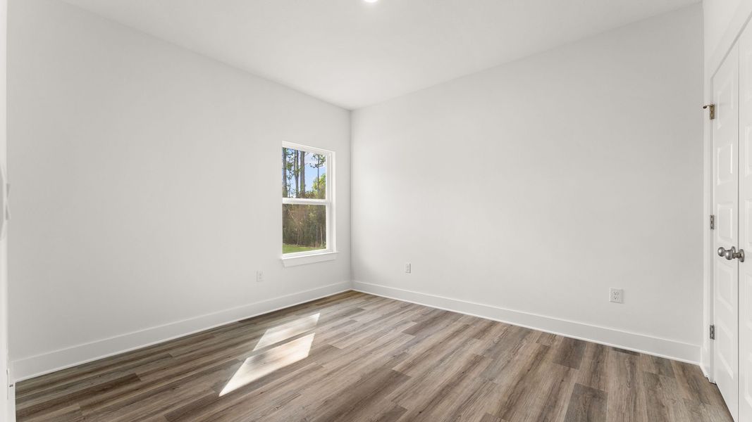 Representative unfurnished interior of a home built from the Kennedy by D.R. Horton in Holley Grove at Peach Creek, Santa Rosa Beach (Image 21). Representative unfurnished interior of a home built from the Kennedy by D.R. Horton in Holley Grove at Peach Creek, Santa Rosa Beach (Image 21).