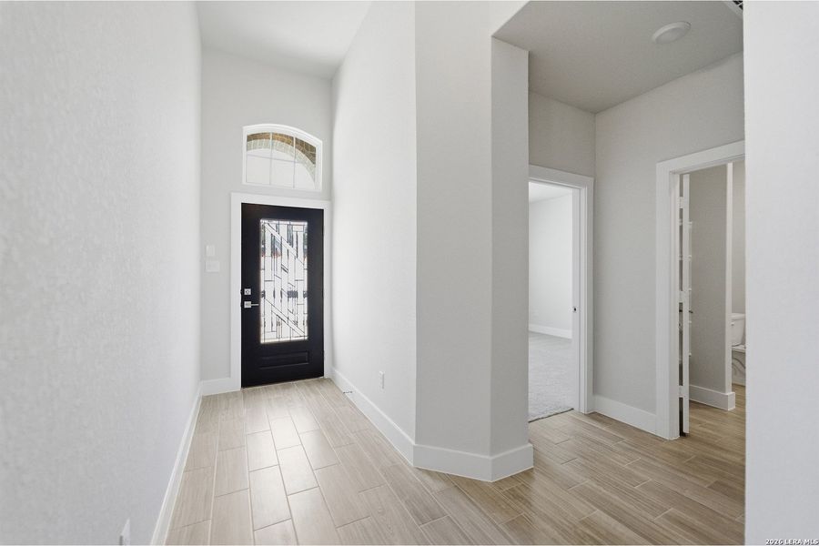 Spacious, unfurnished interior of a new home in The Woodlands at Medina Hills, Mico (Image 32).