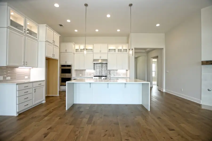 Representative furnished interior of a home built from the Llano II by Giddens Homes in Whispering Wind, Bertram (Image 8). Representative furnished interior of a home built from the Llano II by Giddens Homes in Whispering Wind, Bertram (Image 8).