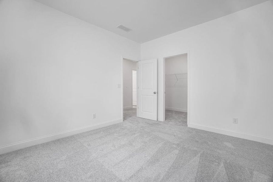 Spacious, unfurnished interior of a new home in Bailey Fence, Dacula (Image 26).