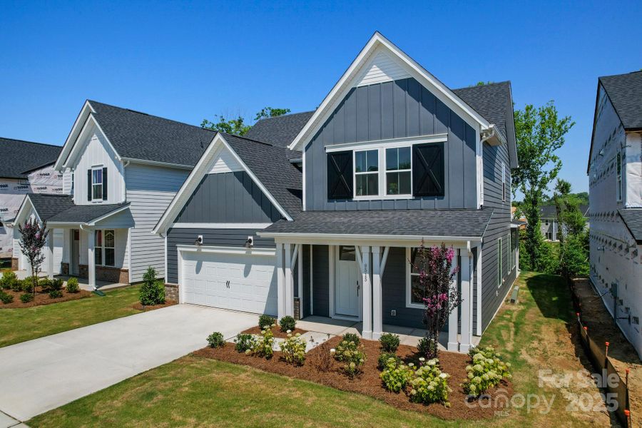Front exterior of a new home in Cannon Run, Concord, NC, highlighting curb appeal (Image 24). Front exterior of a new home in Cannon Run, Concord, NC, highlighting curb appeal (Image 24).