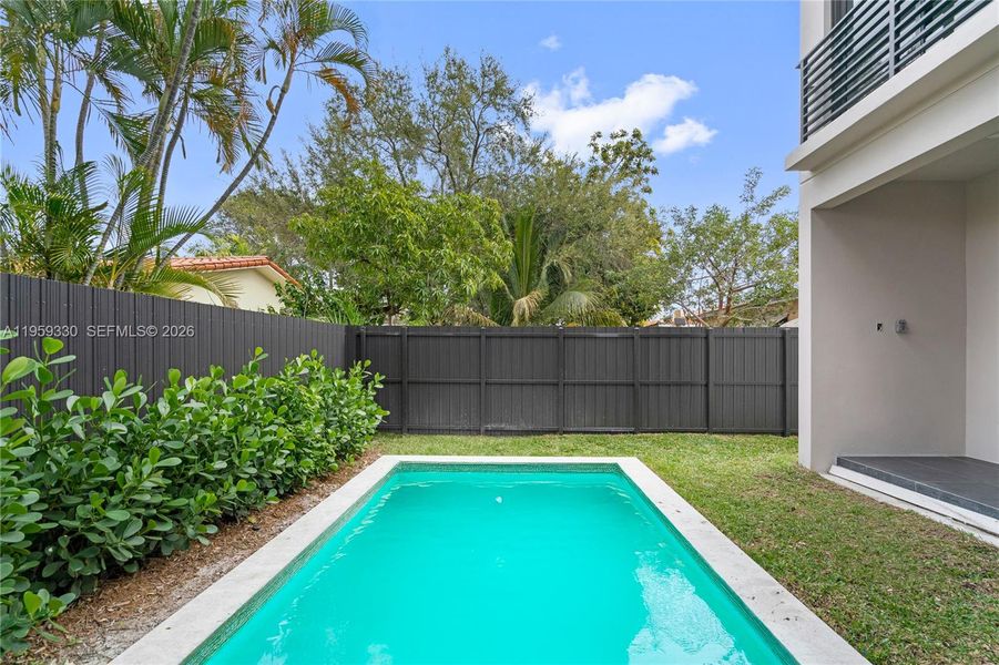 Exterior details and patio area of a home in , Miami (Image 3).