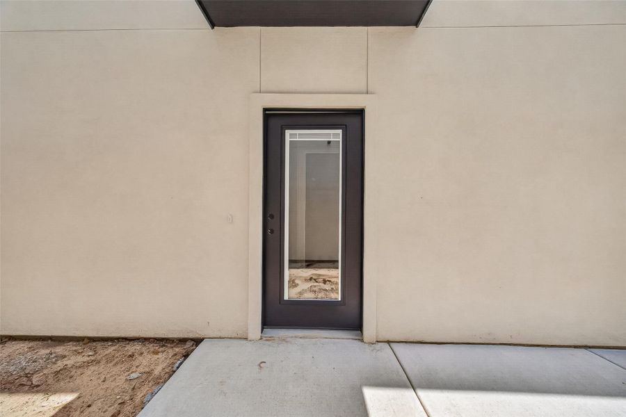 Exterior details and patio area of a home in , Spring (Image 4).
