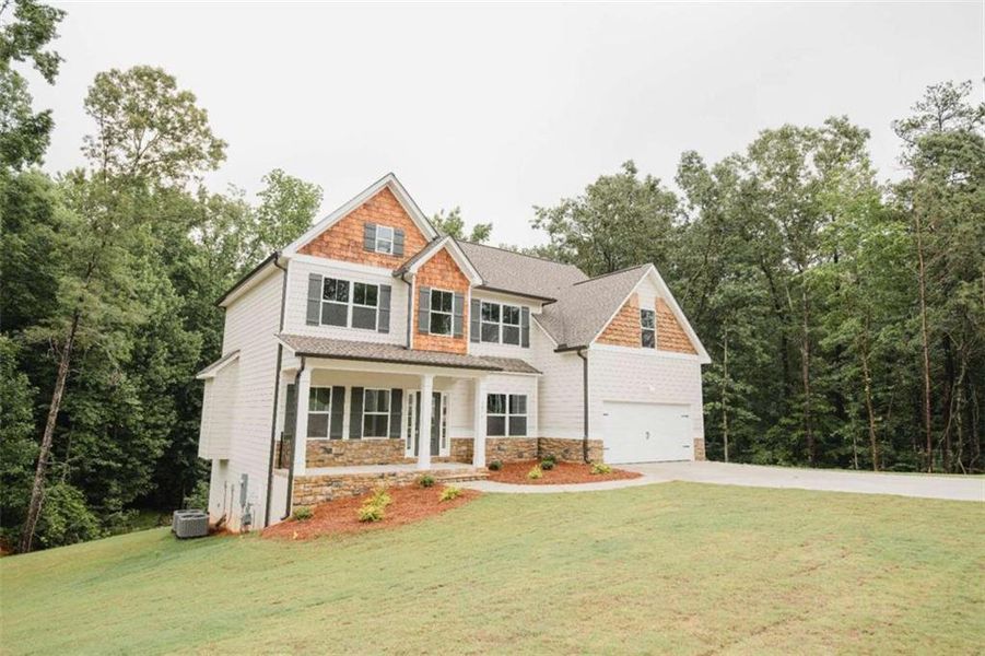 Front exterior of a new home in , Douglasville, GA, highlighting curb appeal (Image 28). Front exterior of a new home in , Douglasville, GA, highlighting curb appeal (Image 28).