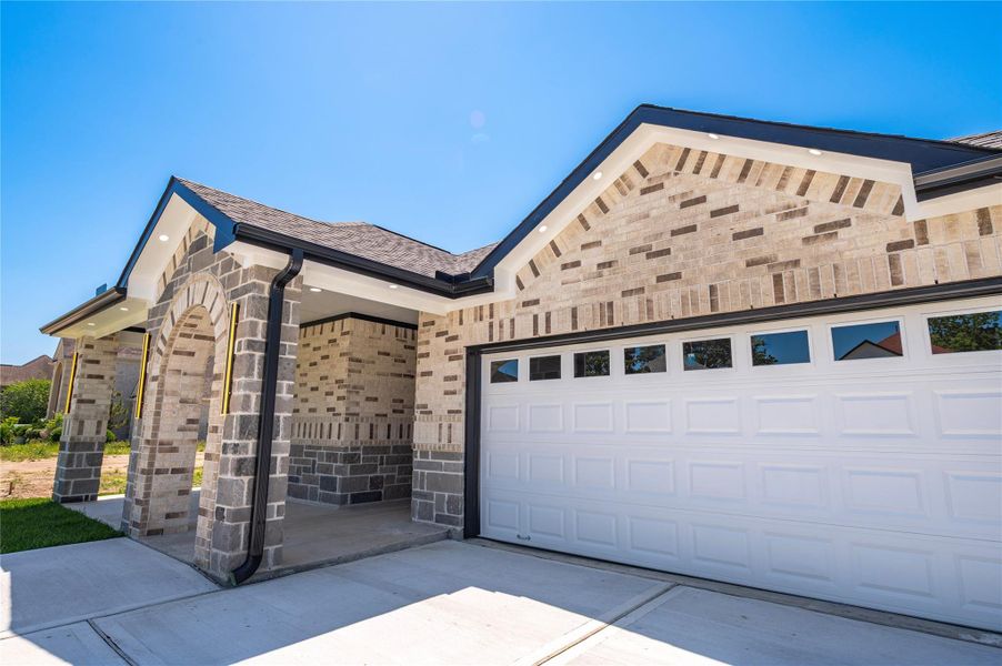 Front exterior of a new home in , Houston, TX, highlighting curb appeal (Image 22).