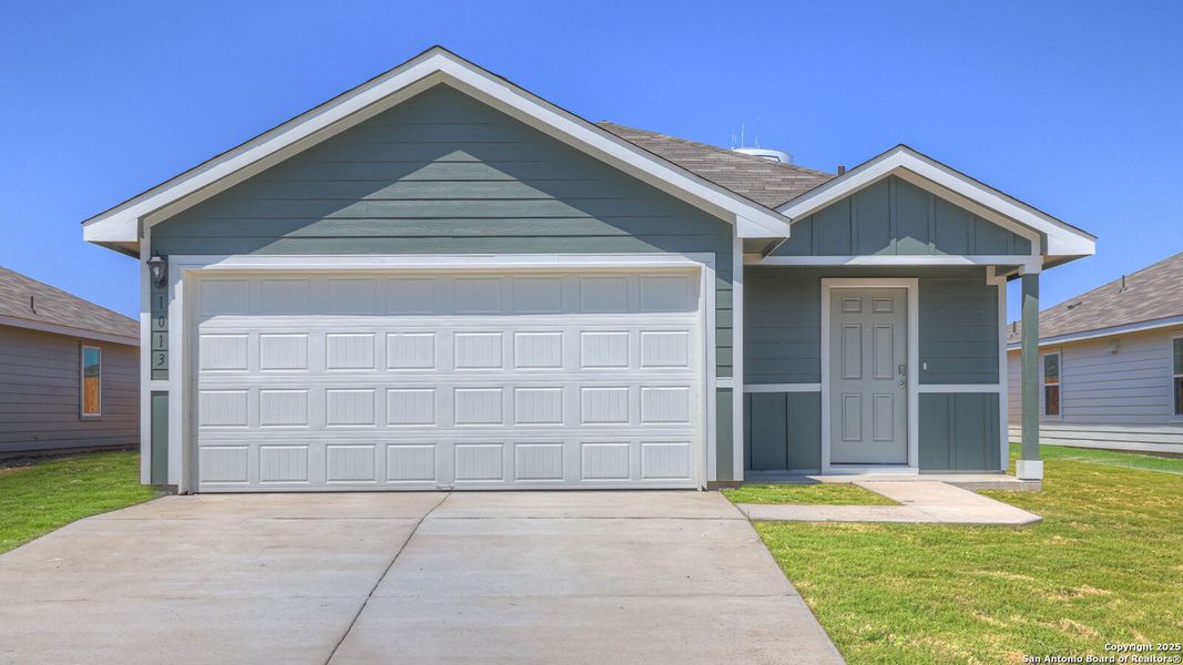 Front exterior of a new home in Navarro Fields, Seguin, TX, highlighting curb appeal (Image 1). Front exterior of a new home in Navarro Fields, Seguin, TX, highlighting curb appeal (Image 1).