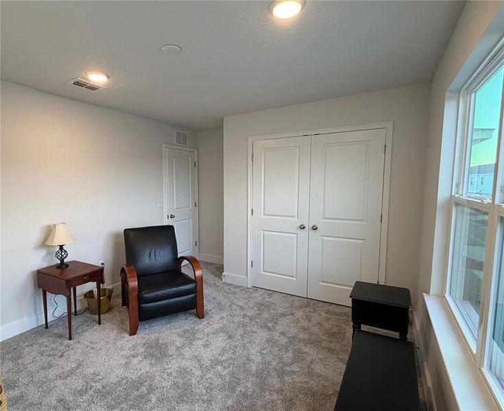 Furnished interior view inside a new home in , Harmony (Image 8).