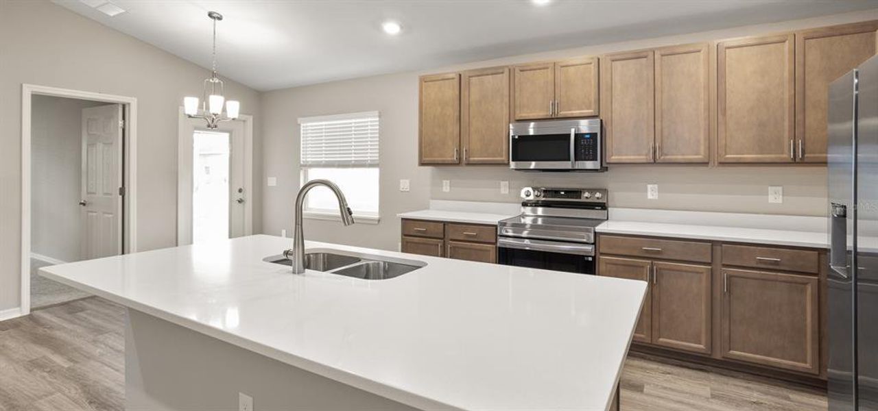 Furnished interior view inside a new home in Vista Trace, Belleview (Image 5).