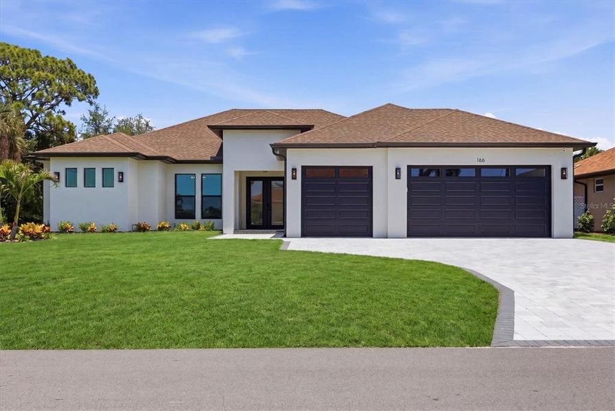 Front exterior of a new home in , Rotonda West, FL, highlighting curb appeal (Image 28).