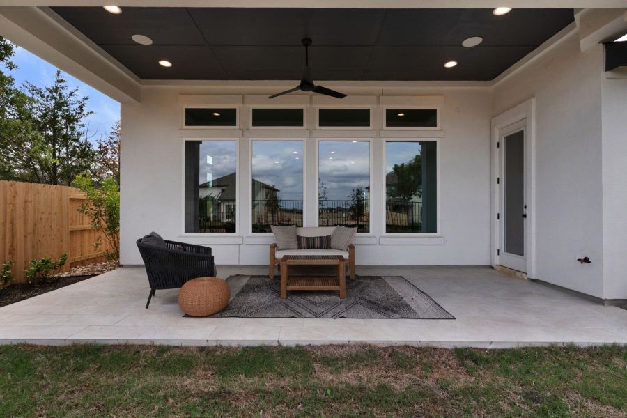 Exterior details and patio area of a home in The Colony- Pine Cove, Bastrop (Image 22).