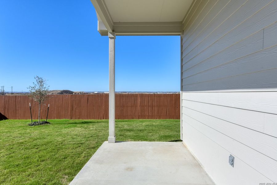 Exterior details and patio area of a home in Megan's Landing, Castroville (Image 4).