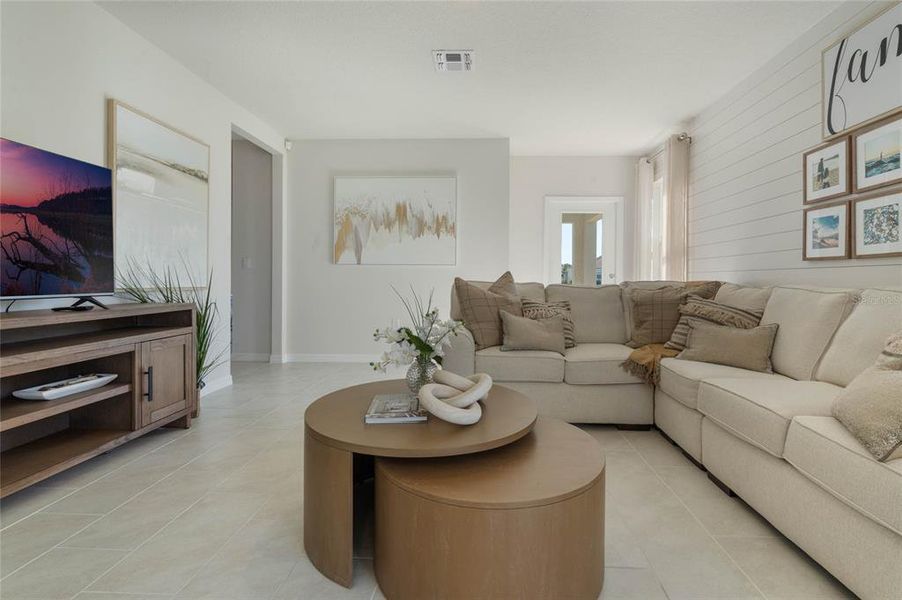 Furnished interior view inside a new home in Lake Deer Estates, Poinciana (Image 8).
