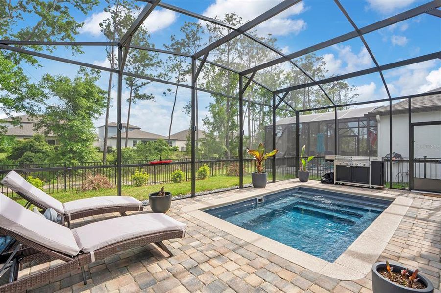 Exterior details and patio area of a home in Legends Preserve - Reserve Series, Daytona Beach (Image 20).