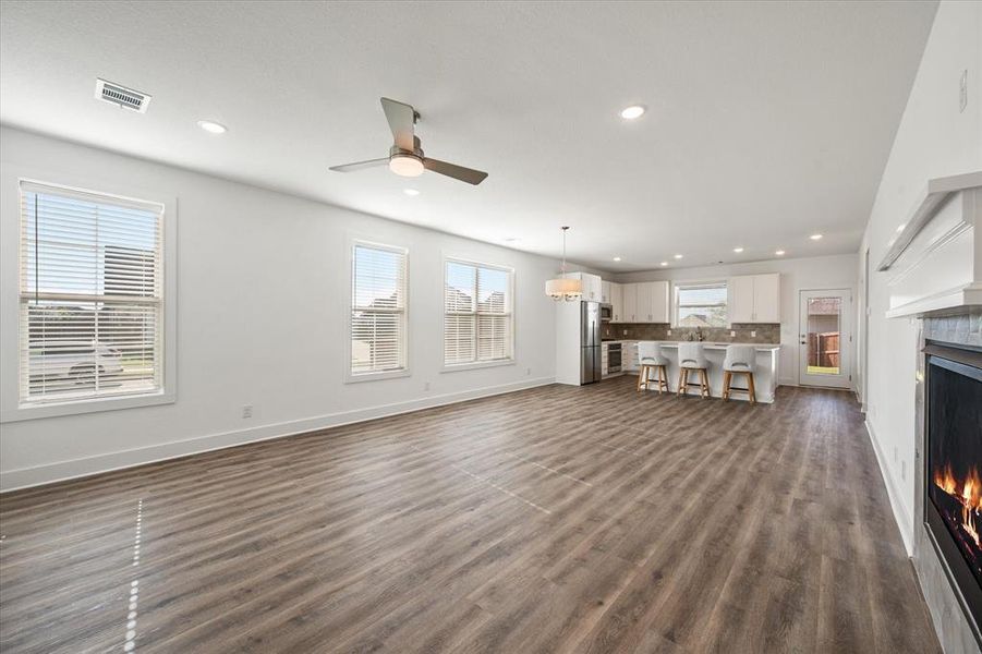 Open Concept Living, Dining & Kitchen, recessed lighting, LVP flooring in all bedrooms, designer ceramic tile in wet areas and ceiling fans in all bedrooms.