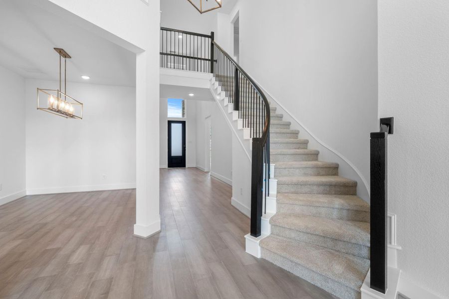 *REPRESENTATIONAL PHOTO* Rounded Staircase Creates Grand Entrance With Modern Appeal *REPRESENTATIONAL PHOTO* Rounded Staircase Creates Grand Entrance With Modern Appeal