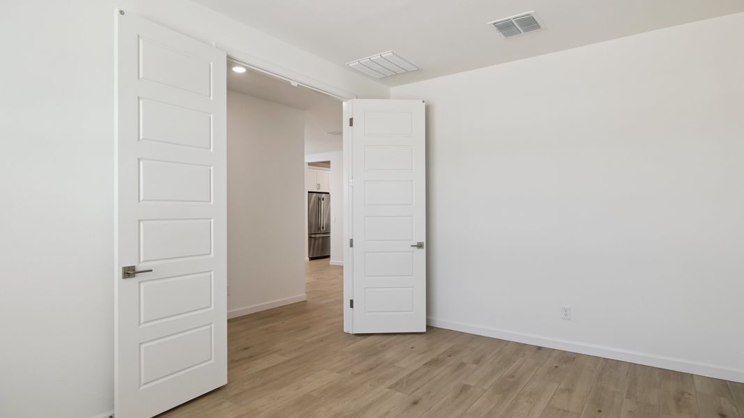 Spacious, unfurnished interior of a new home in Zanjero Pass, Waddell (Image 21).