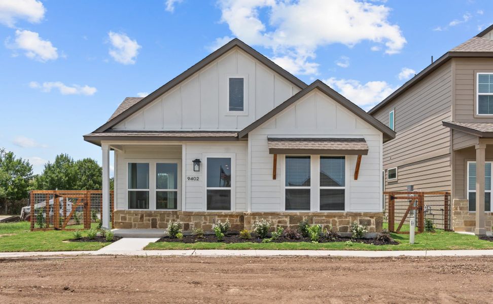 Front exterior of a new home in The Crossvine, Schertz, TX, highlighting curb appeal (Image 18). Front exterior of a new home in The Crossvine, Schertz, TX, highlighting curb appeal (Image 18).