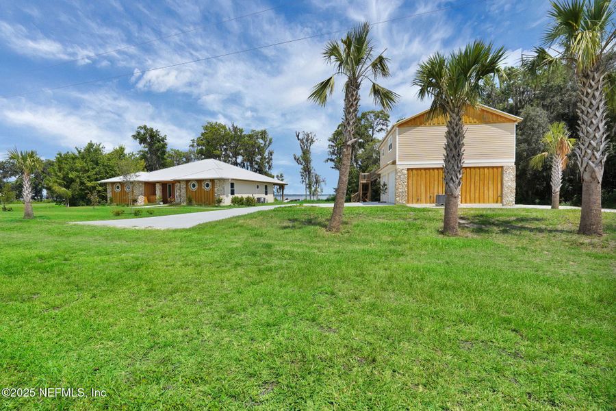 Front exterior of a new home in , East Palatka, FL, highlighting curb appeal (Image 45). Front exterior of a new home in , East Palatka, FL, highlighting curb appeal (Image 45).