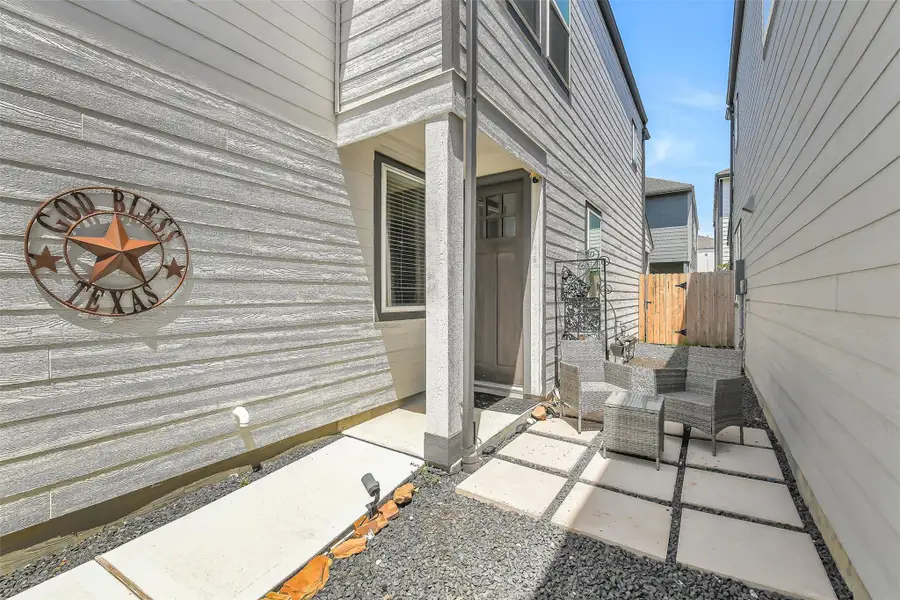 Eye-catching two-story exterior with timeless curb appeal, modern design elements, and a welcoming front presence that stands out in the community.