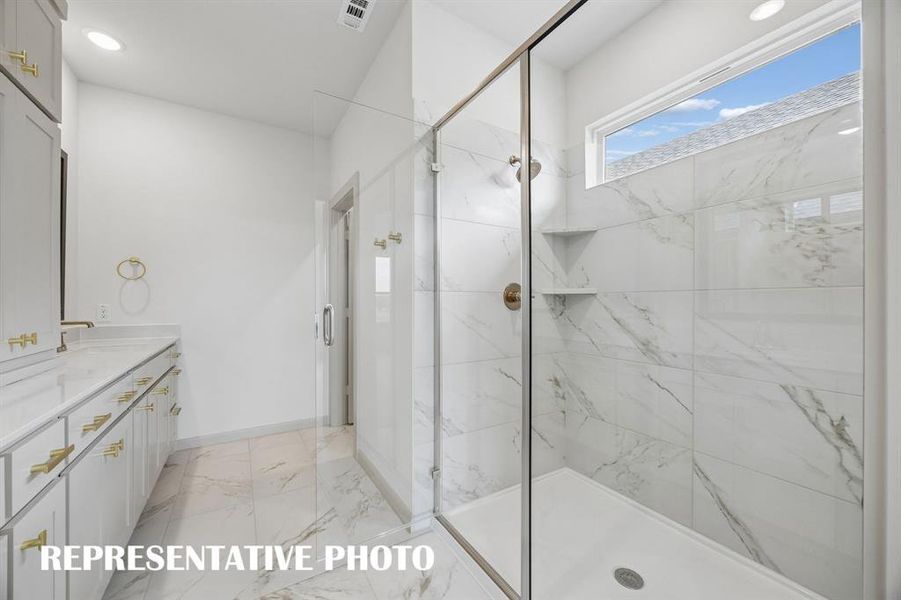 Featuring an oversized walk in shower, long luxurious showers are in your future!  REPRESENTATIVE PHOTO