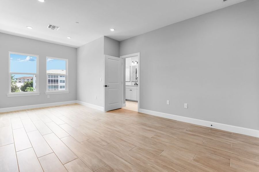 Representative unfurnished interior of a home built from the Miramar by Taylor Morrison in Seahaven, Punta Gorda (Image 15).