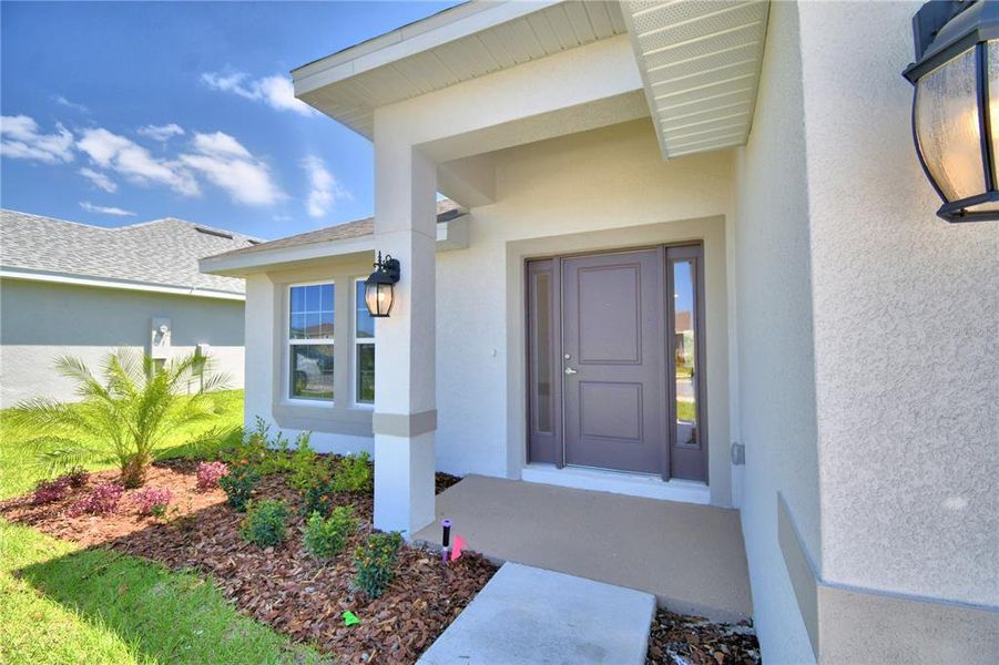 Exterior details and patio area of a home in Cadence Crossing, Auburndale (Image 2). Exterior details and patio area of a home in Cadence Crossing, Auburndale (Image 2).
