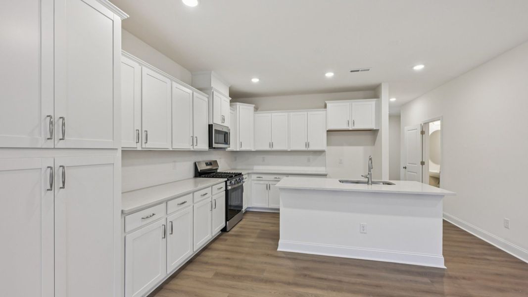 Furnished interior view inside a new home in Kensley Grove, Fuquay Varina (Image 11).