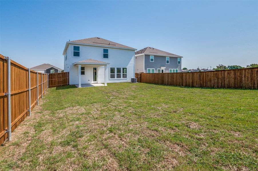 Front exterior of a new home in Cottonwood Creek, Seagoville, TX, highlighting curb appeal (Image 17).