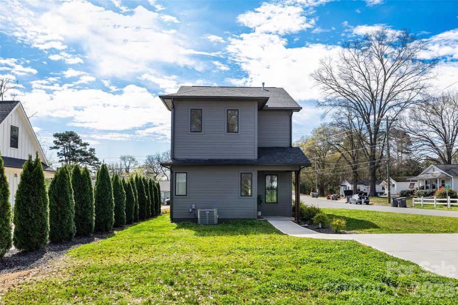 Front exterior of a new home in , Belmont, NC, highlighting curb appeal (Image 23).