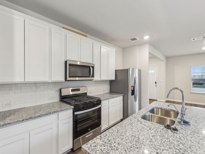 Furnished interior view inside a new home in Flora, Hutto (Image 3).