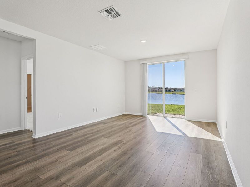Spacious, unfurnished interior of a new home in Lake Deer Estates - Signature Series, Poinciana (Image 8).