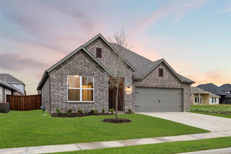 Front exterior of a new home in Creekside, Royse City, TX, highlighting curb appeal (Image 2).