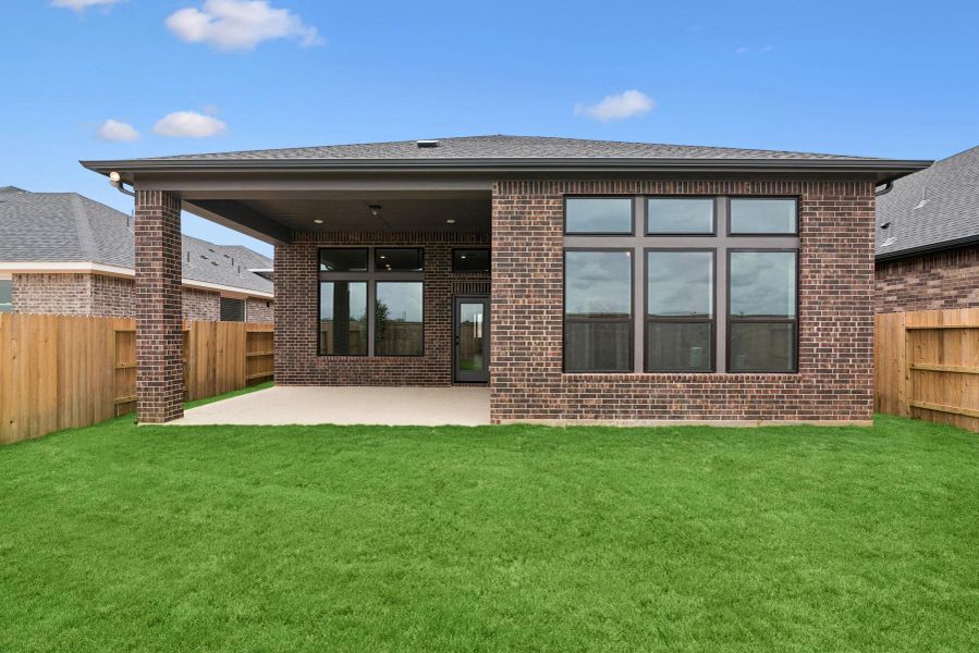 Exterior details and patio area of a home in Grange - Reserve Collection, Katy (Image 3).