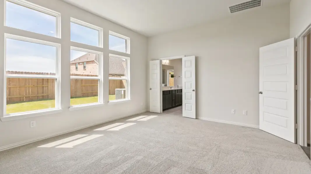 Furnished interior view inside a new home in Oakwood Estates, Waller (Image 11).