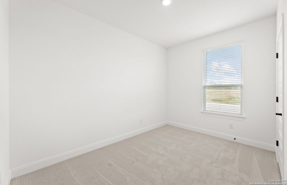 Spacious, unfurnished interior of a new home in Dove Song, Marion (Image 22).
