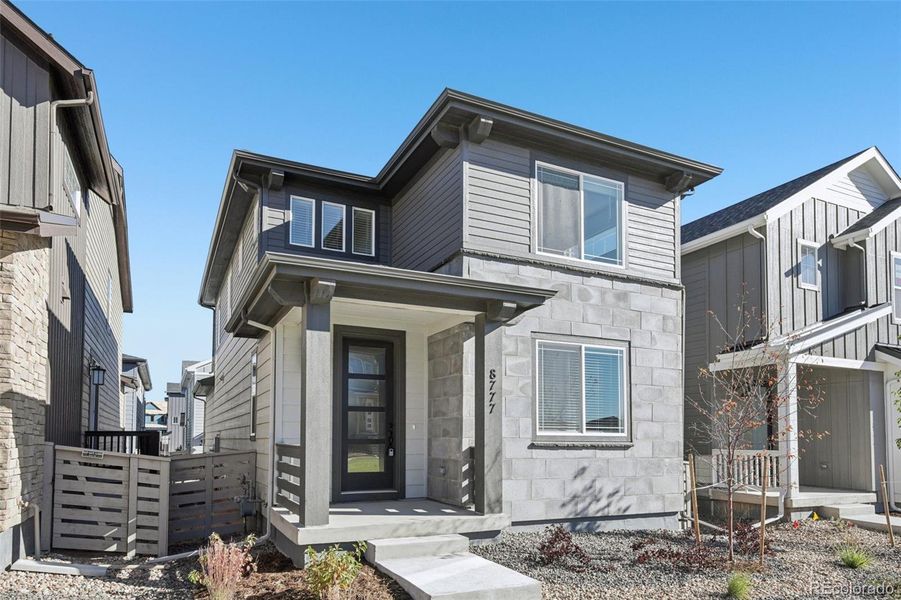 Exterior details and patio area of a home in The Villas Collection at Sterling Ranch, Littleton (Image 21).