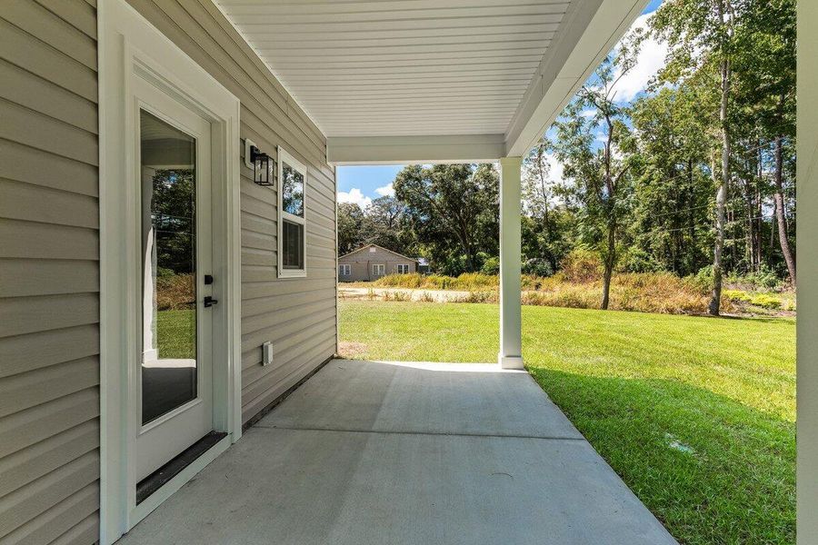 Exterior details and patio area of a home in , Ravenel (Image 3).