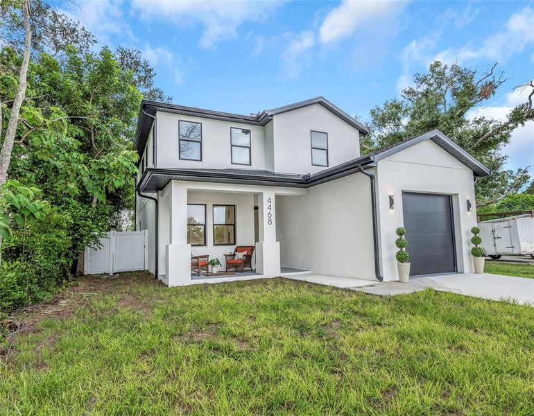 Front exterior of a new home in , St. Petersburg, FL, highlighting curb appeal (Image 22). Front exterior of a new home in , St. Petersburg, FL, highlighting curb appeal (Image 22).